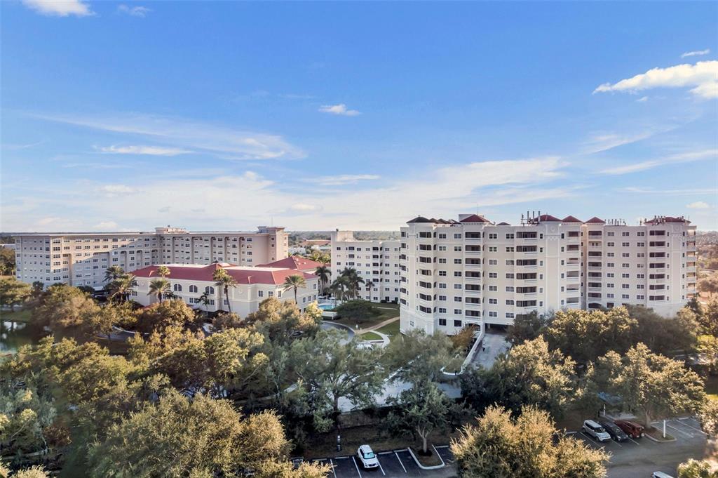 3730 Cadbury Circle, Unit 431 Venice, FL 34293 - Photo 32 of 34 a view of a city with tall buildings