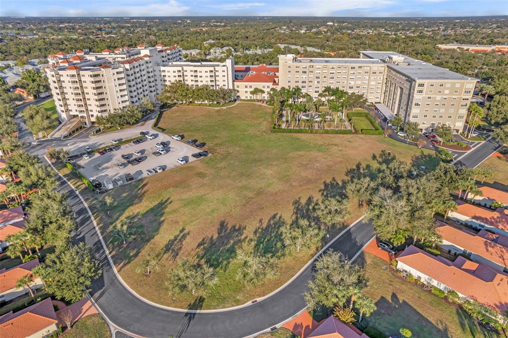 3730 Cadbury Circle, Unit 431 Venice, FL 34293 - Photo 33 of 34 an aerial view of residential houses with outdoor space