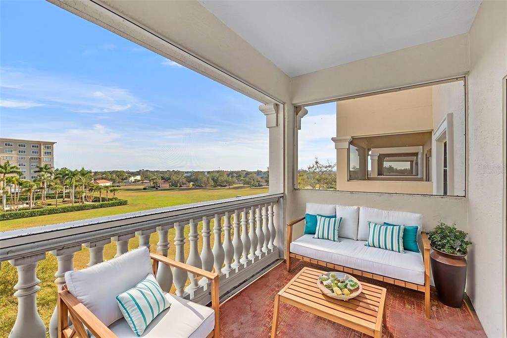 3730 Cadbury Circle, Unit 431 Venice, FL 34293 - Photo 6 of 34 a view of a balcony with furniture