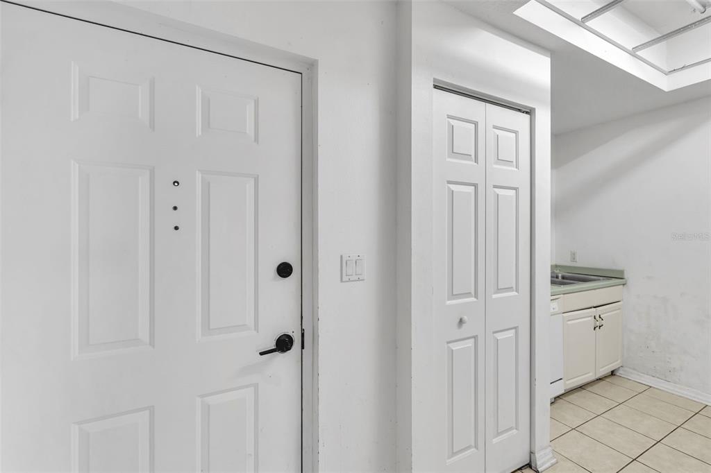 3730 Cadbury Circle, Unit 431 Venice, FL 34293 - Photo 10 of 34 a view of a kitchen with white cabinets