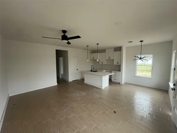 a view of a bathtub & sink in a room