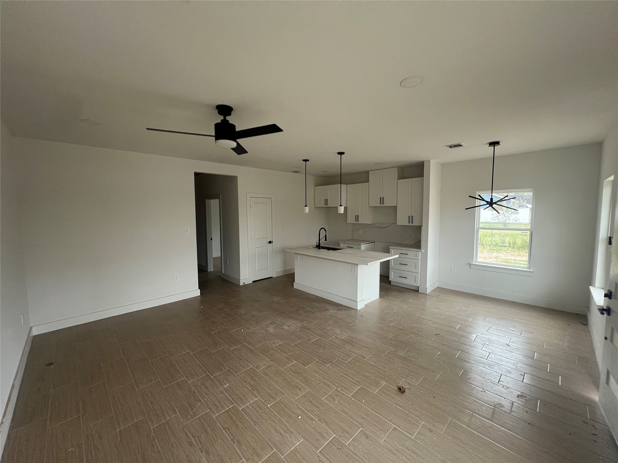 5710 Delmack Street, Unit B Houston, TX 77032 - Photo 3 of 12 a view of a bathtub & sink in a room