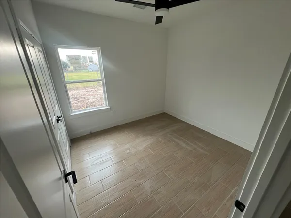 an empty room with windows