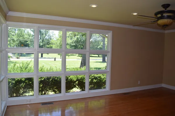 a view of room with window and tub