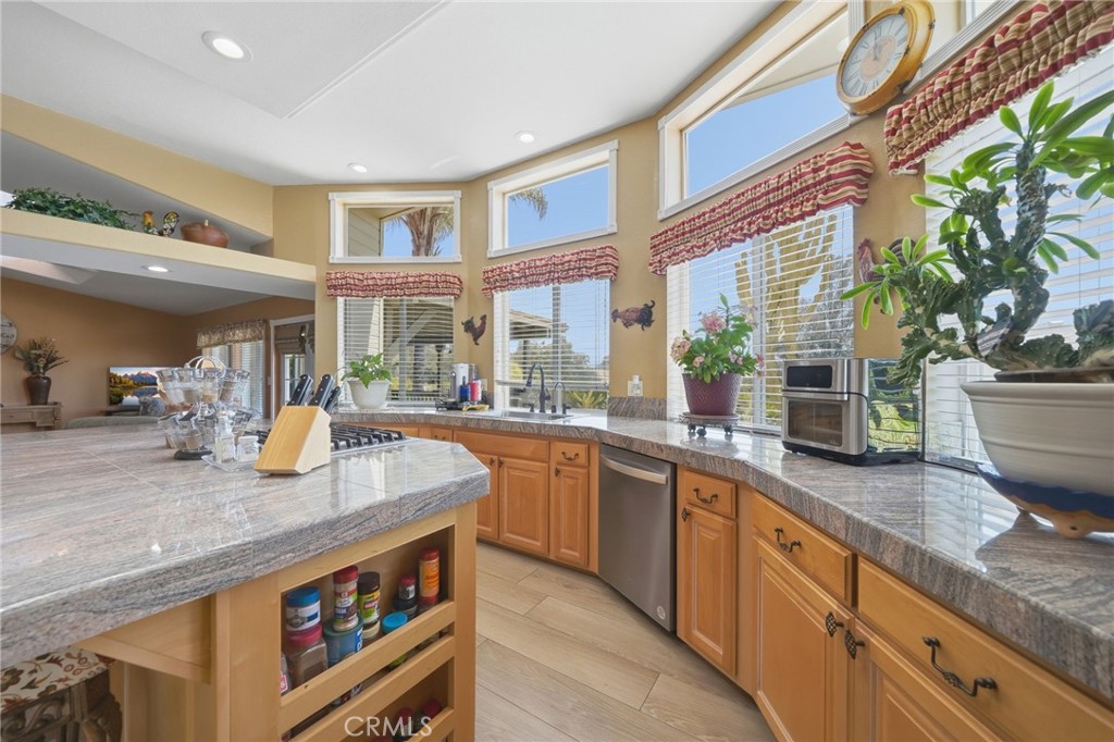 35780 Greer Road Murrieta, CA 92562 - Photo 10 of 56 Kitchen w smart storage and brand new dishwasher w windows overlooking the rear of property