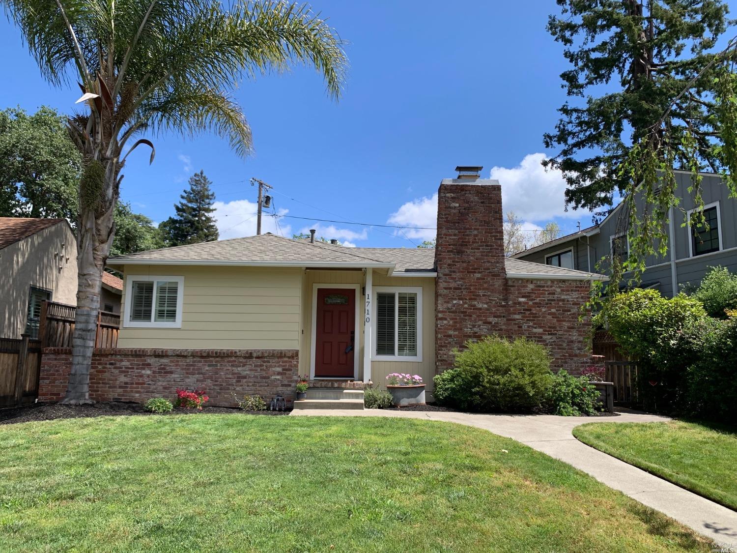 1710 Proctor Drive Santa Rosa, CA 95404 - Photo 1 of 1 a front view of a house with a garden