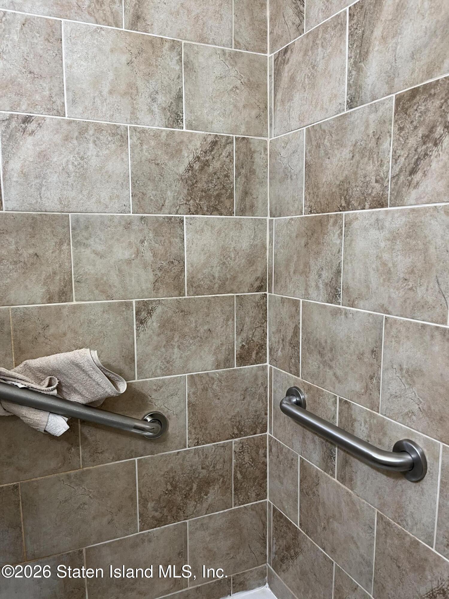 1000 Clove Road, Unit LD Staten Island, NY 10301 - Photo 15 of 21 a bathroom with a shower