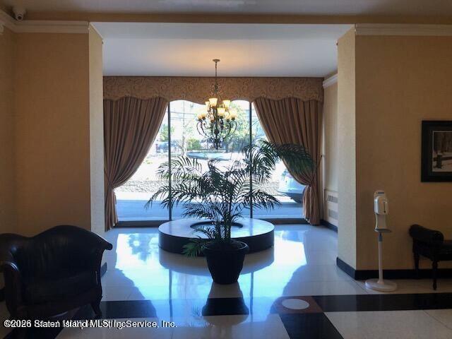 1000 Clove Road, Unit LD Staten Island, NY 10301 - Photo 6 of 21 a living room with furniture and a large window