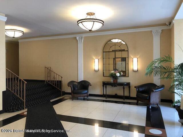 1000 Clove Road, Unit LD Staten Island, NY 10301 - Photo 7 of 21 a view of a lobby with furniture and chandelier
