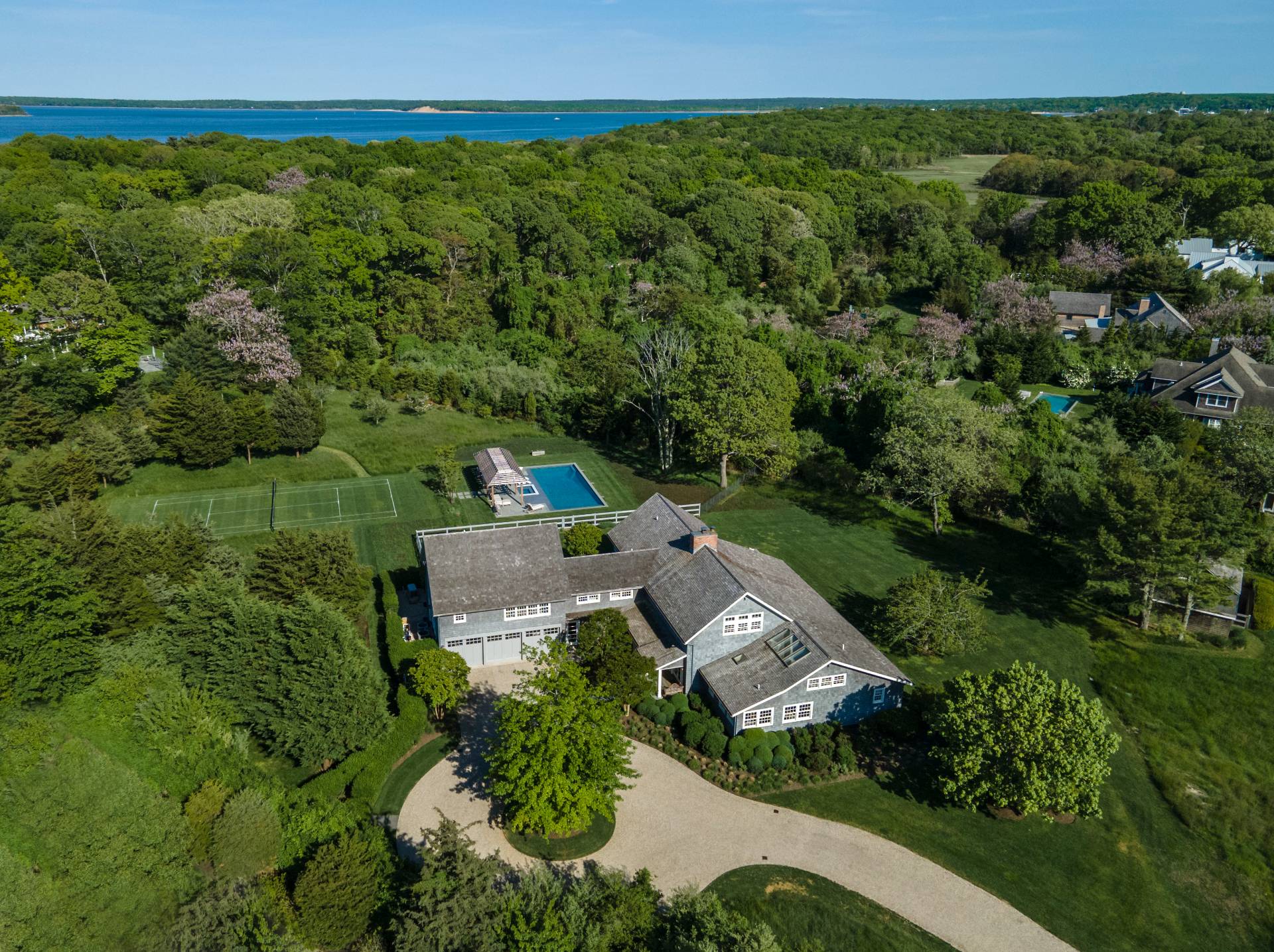 an aerial view of a house with a garden