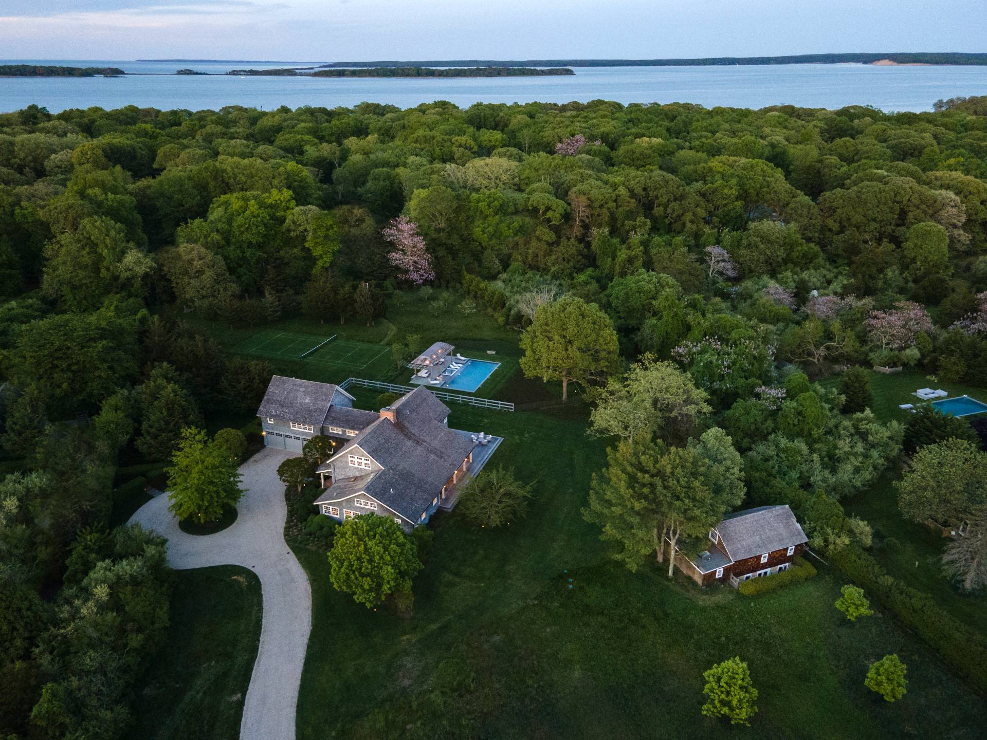 274 Ferry Road Sag Harbor, NY 11963 - Photo 12 of 50 an aerial view of a house with a yard