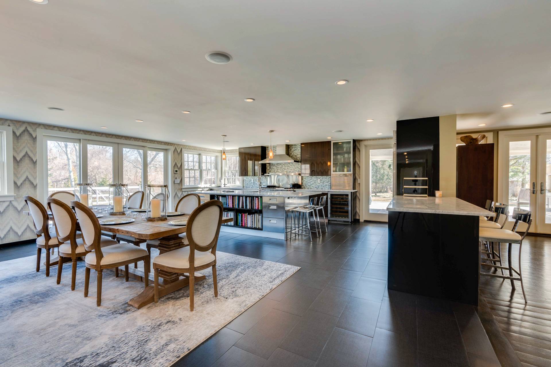 274 Ferry Road Sag Harbor, NY 11963 - Photo 19 of 50 a view of a dining room with furniture window and wooden floor