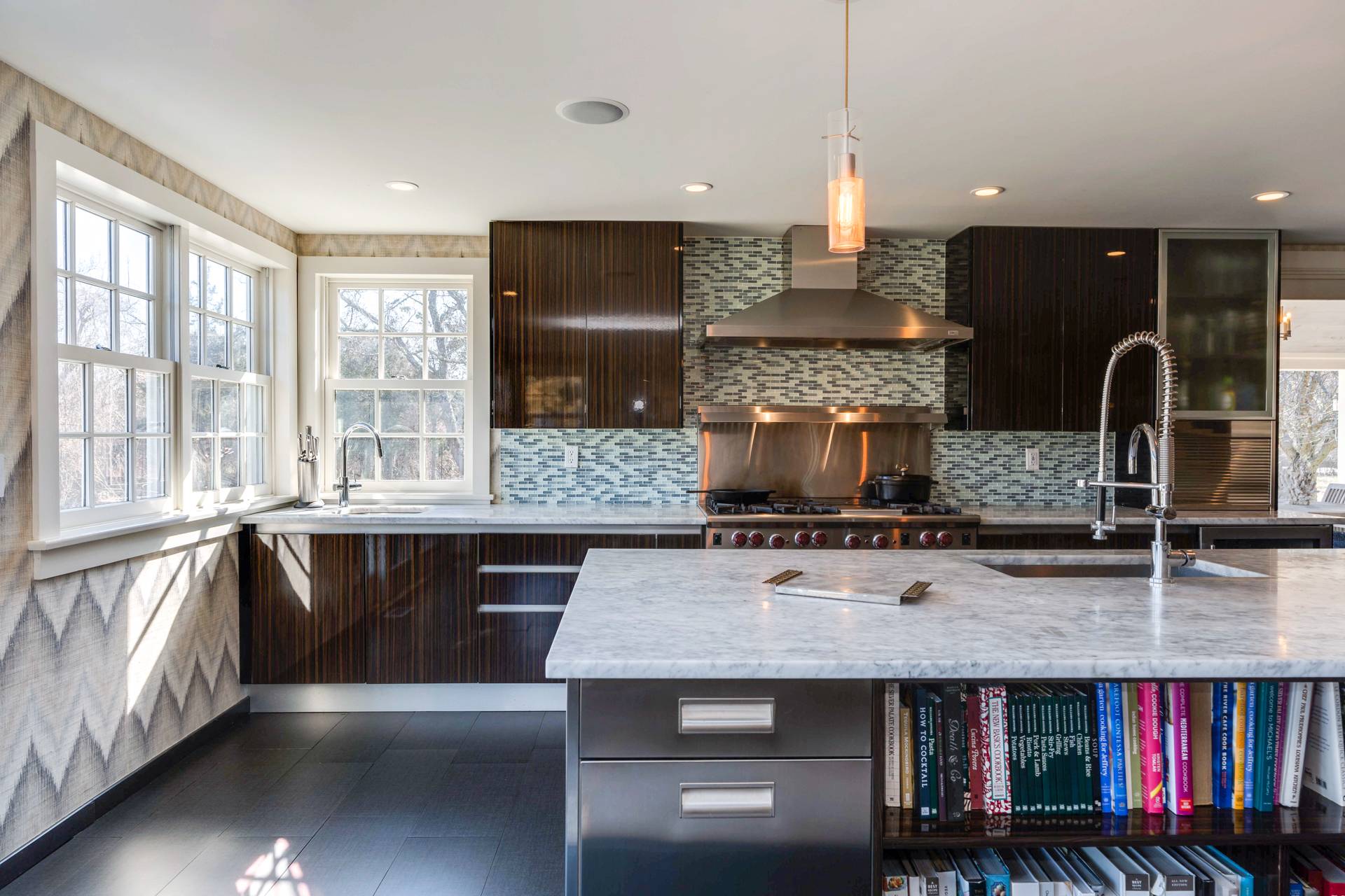 274 Ferry Road Sag Harbor, NY 11963 - Photo 21 of 50 a kitchen with stainless steel appliances granite countertop a stove and a sink