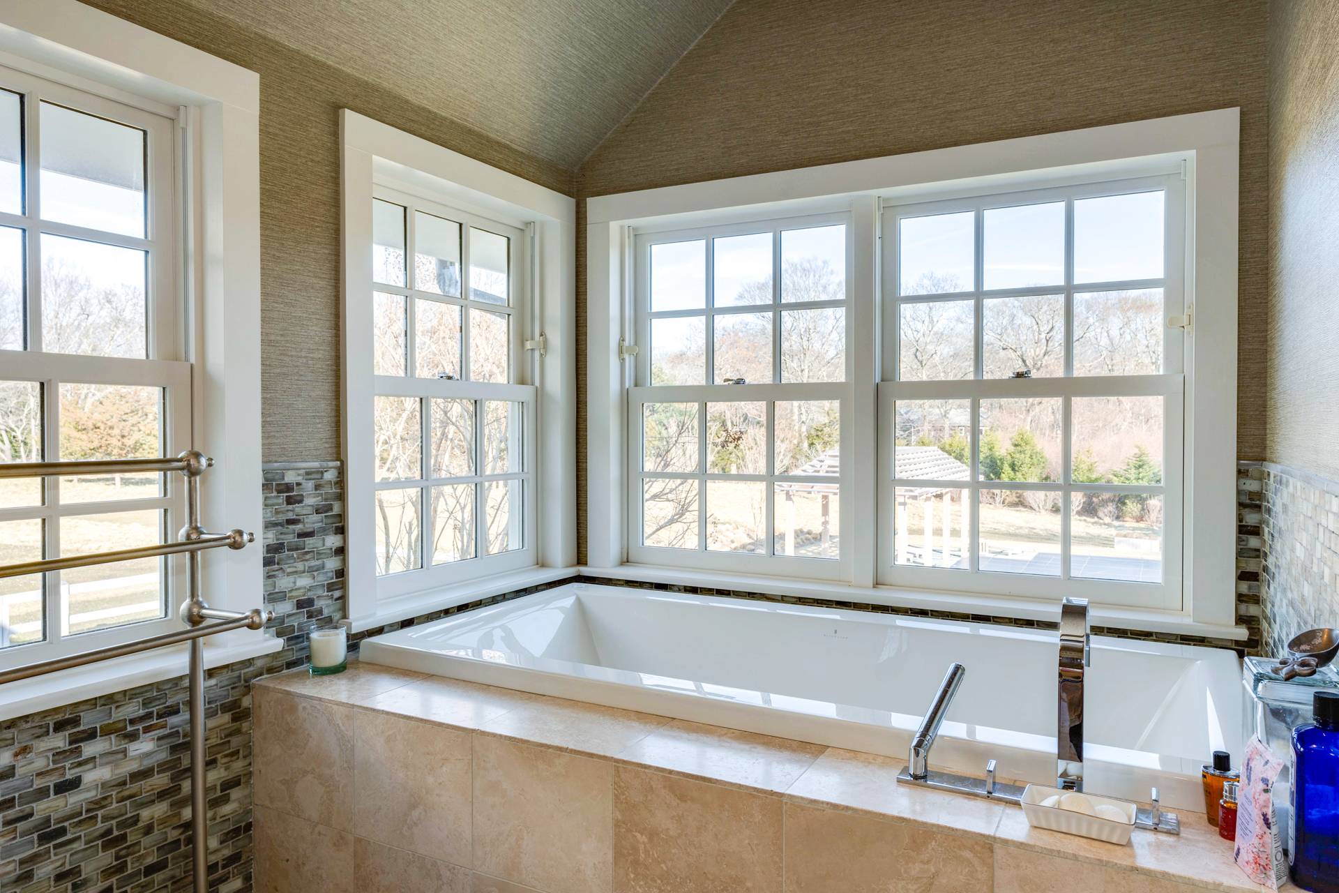 274 Ferry Road Sag Harbor, NY 11963 - Photo 32 of 50 a bath tub sitting in a bathroom next to a window