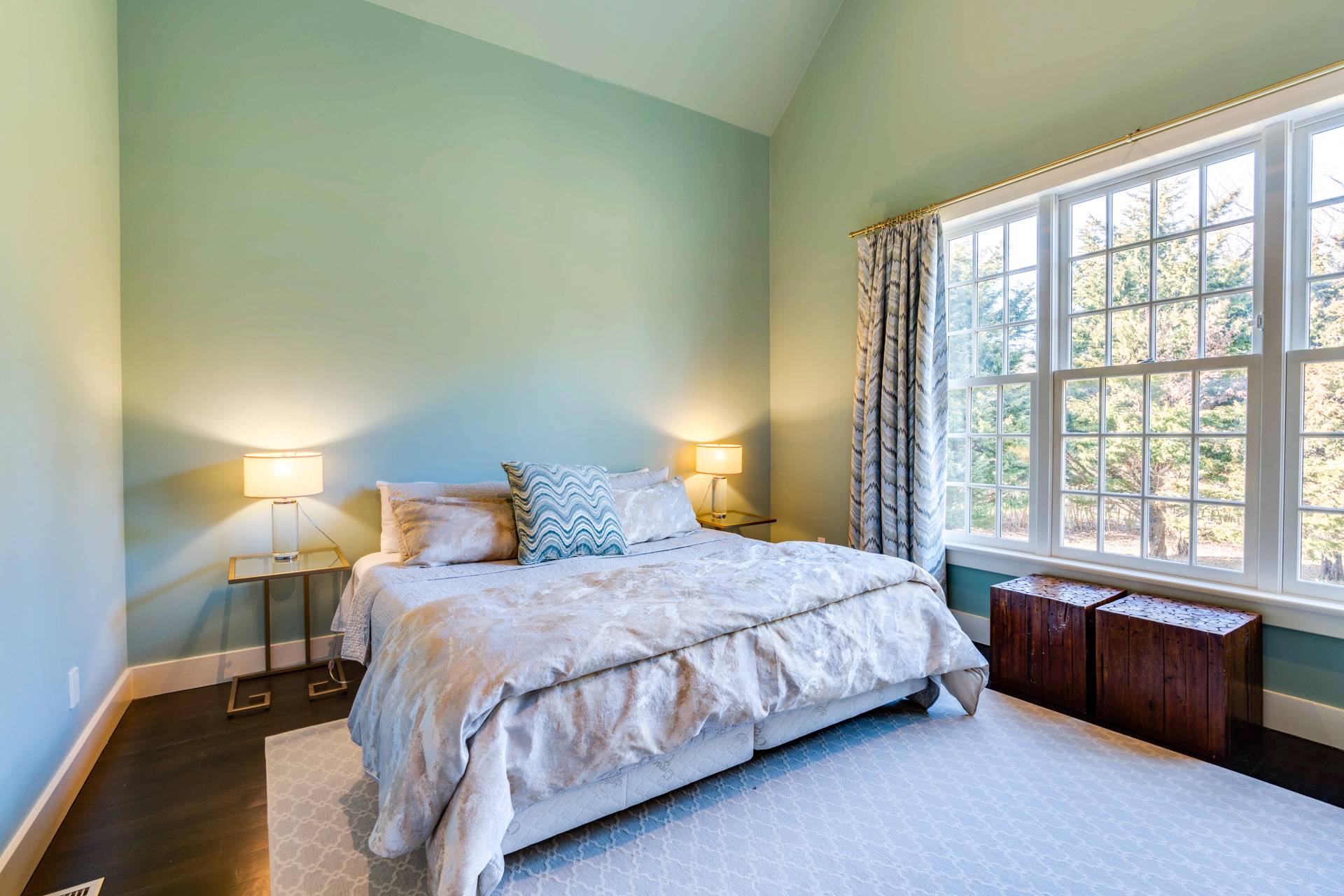 274 Ferry Road Sag Harbor, NY 11963 - Photo 34 of 50 a bedroom with a bed and a large window