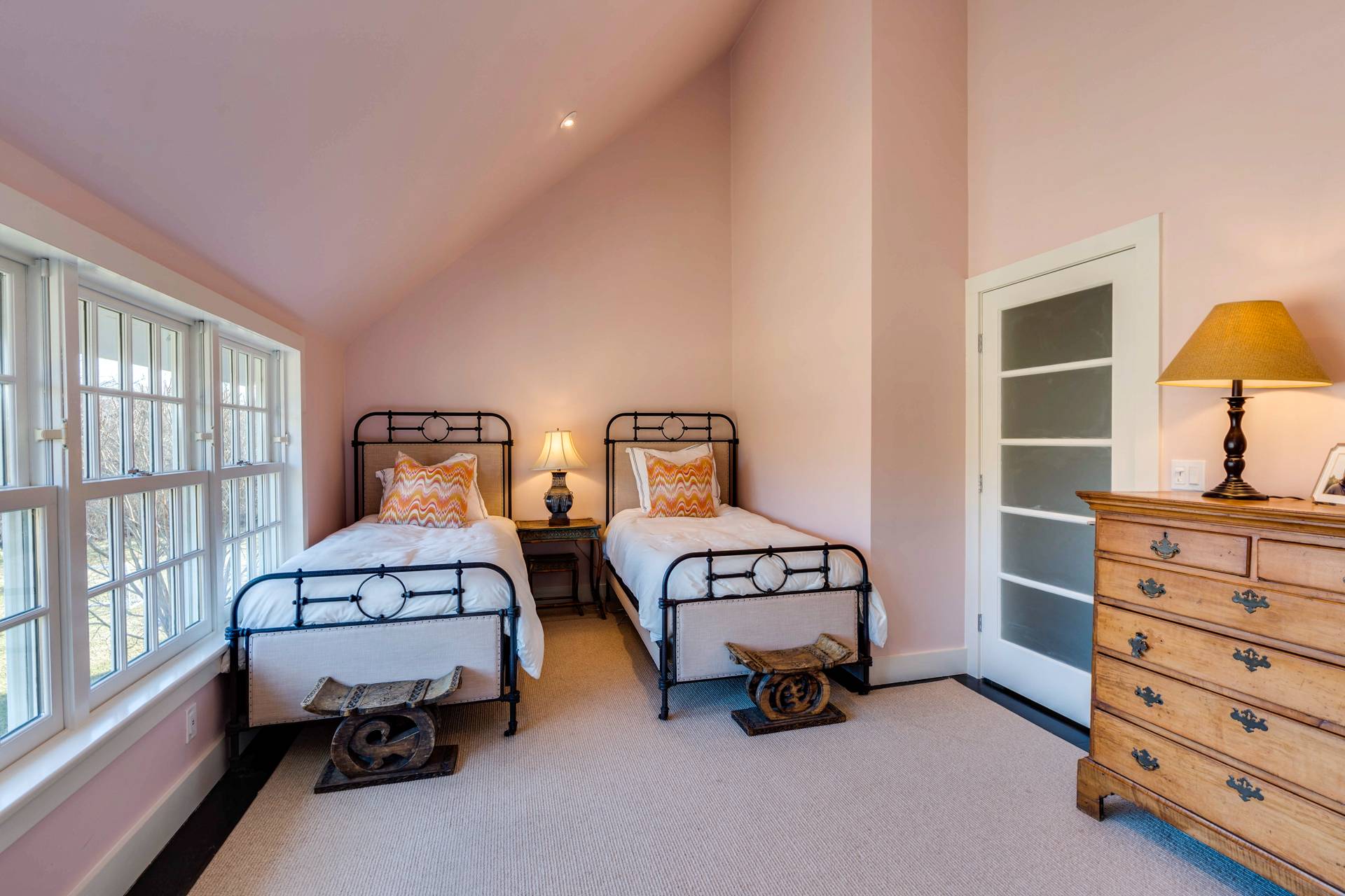 274 Ferry Road Sag Harbor, NY 11963 - Photo 35 of 50 a bedroom with furniture and a window