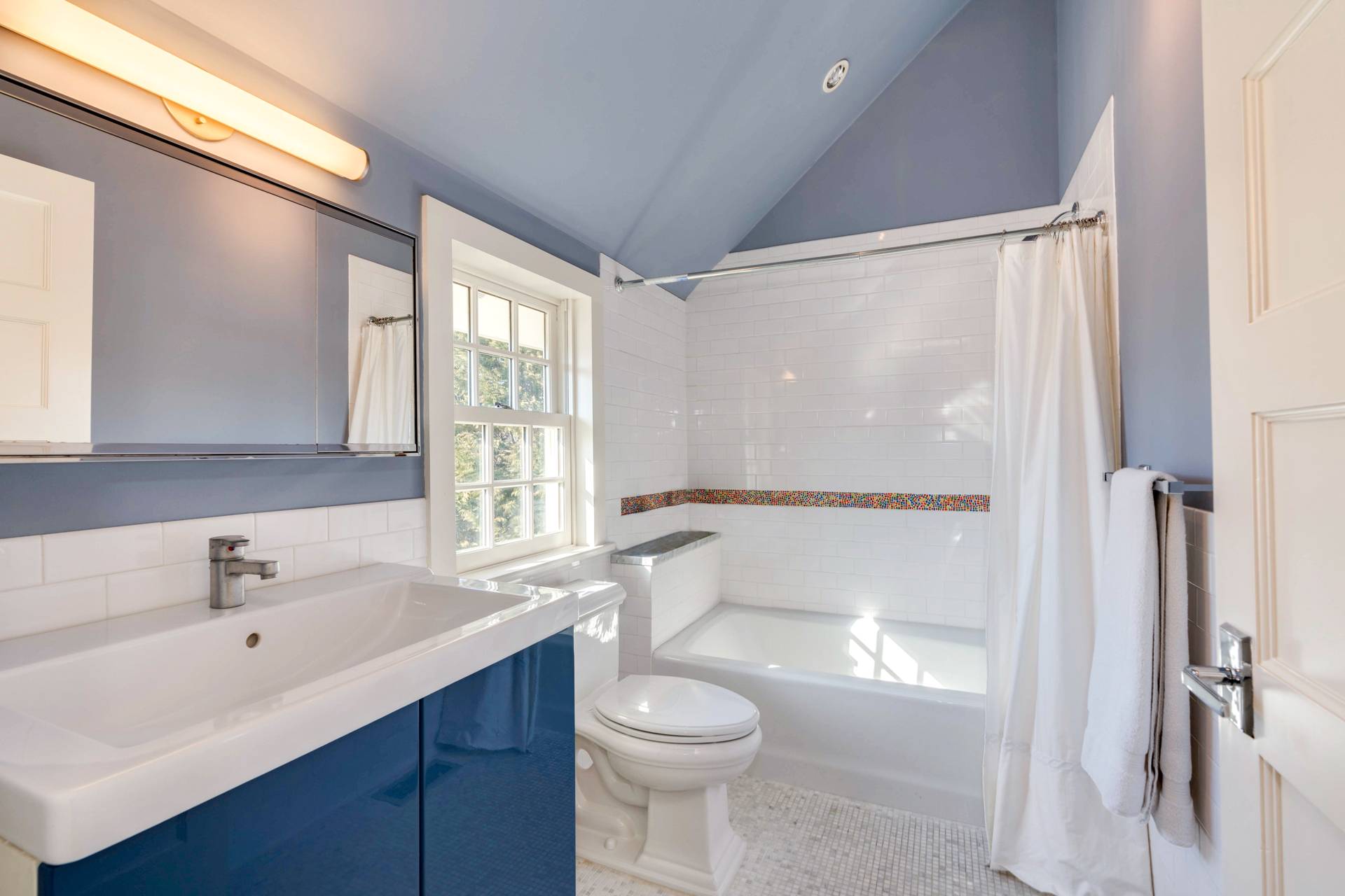 274 Ferry Road Sag Harbor, NY 11963 - Photo 37 of 50 a bathroom with a sink toilet and shower