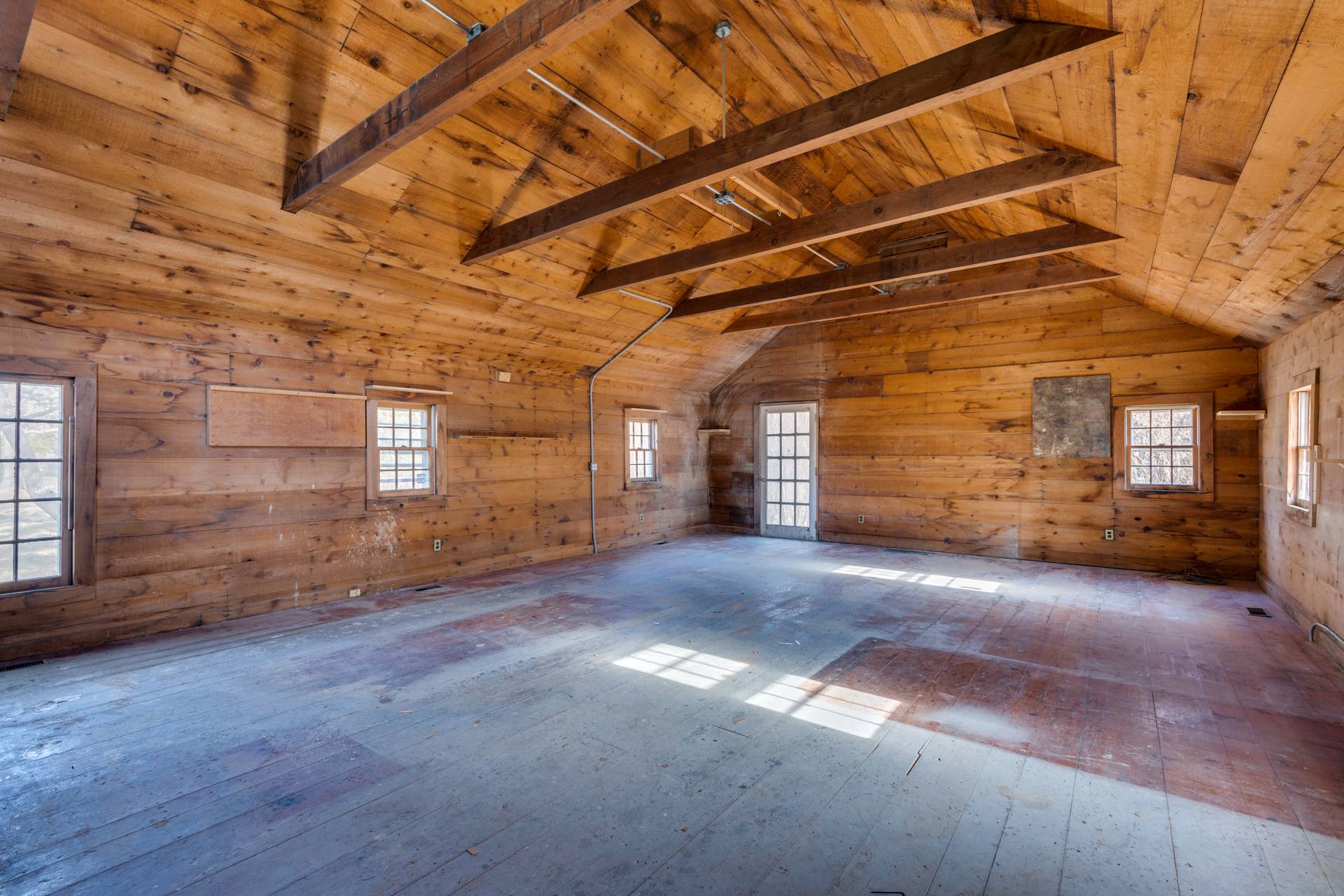 274 Ferry Road Sag Harbor, NY 11963 - Photo 47 of 50 a view of a room with wooden walls