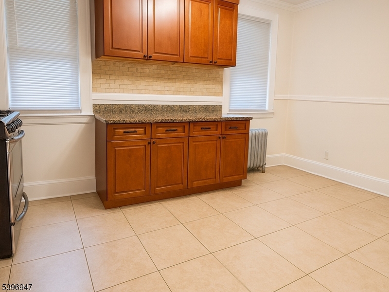 a view of a kitchen with a sink