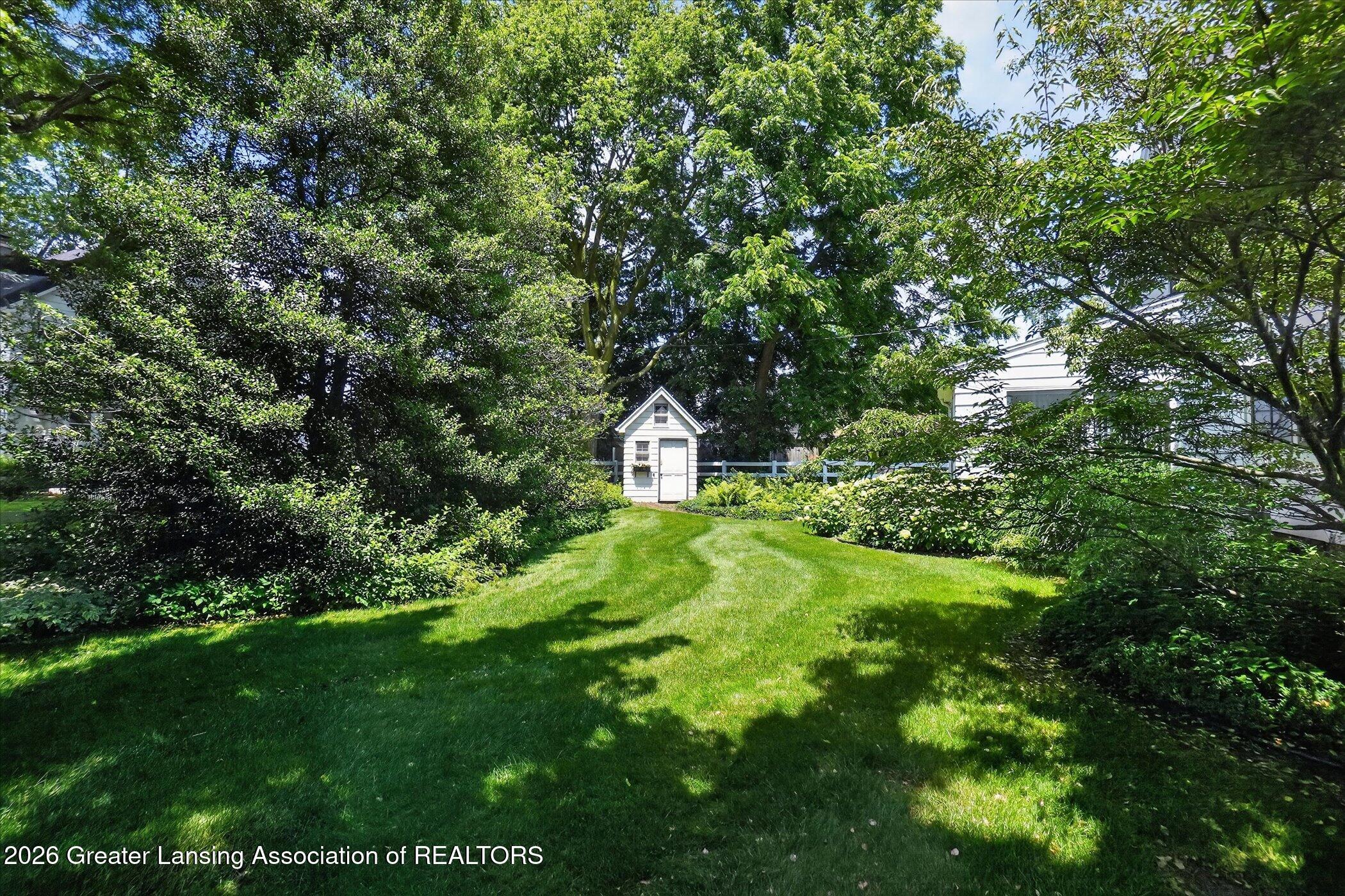 1716 Tecumseh River Road Lansing, MI 48906 - Photo 47 of 51 Side Yard