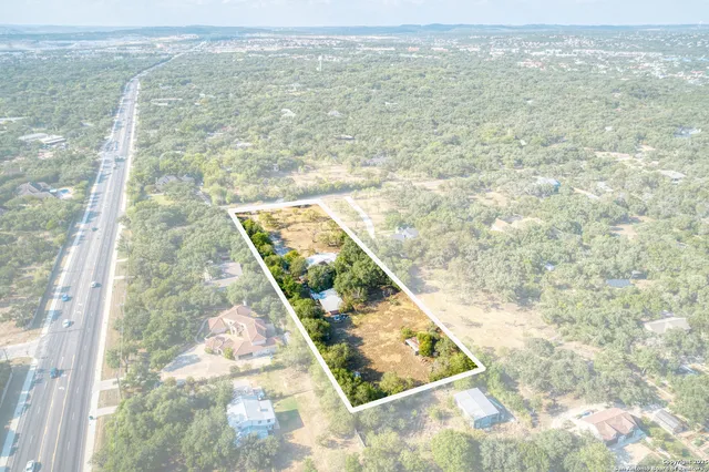 a view of a balcony with an outdoor space