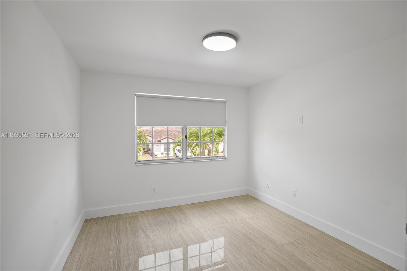 12894 Southwest 60th Terrace Miami, FL 33183 - Photo 27 of 66 an empty room with windows