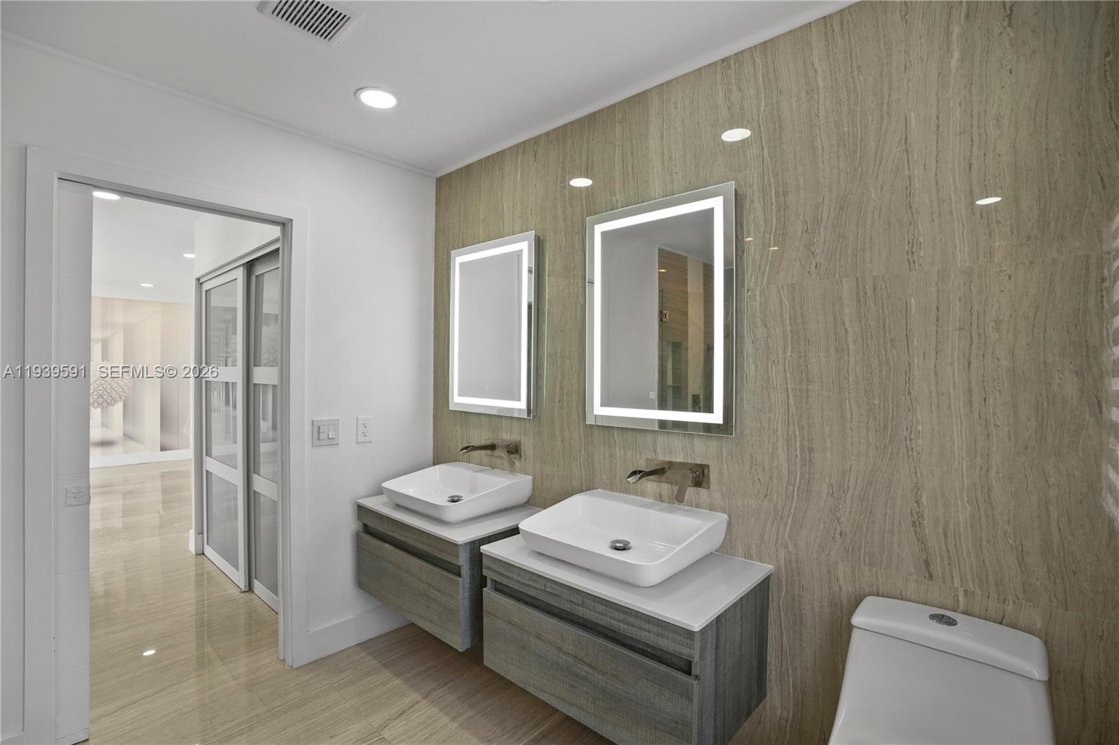 12894 Southwest 60th Terrace Miami, FL 33183 - Photo 41 of 66 a spacious bathroom with a sink a toilet and shower