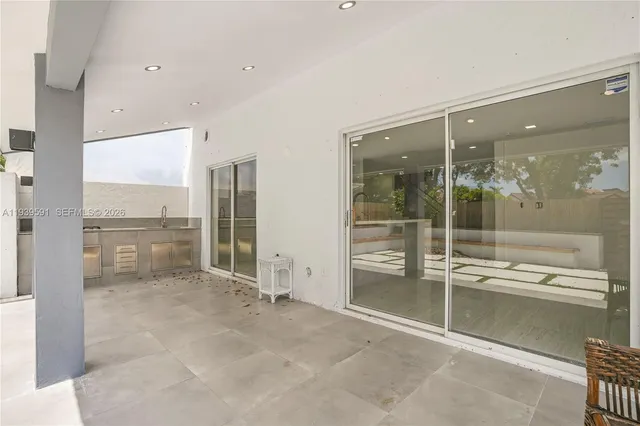 swimming pool view with a garden space