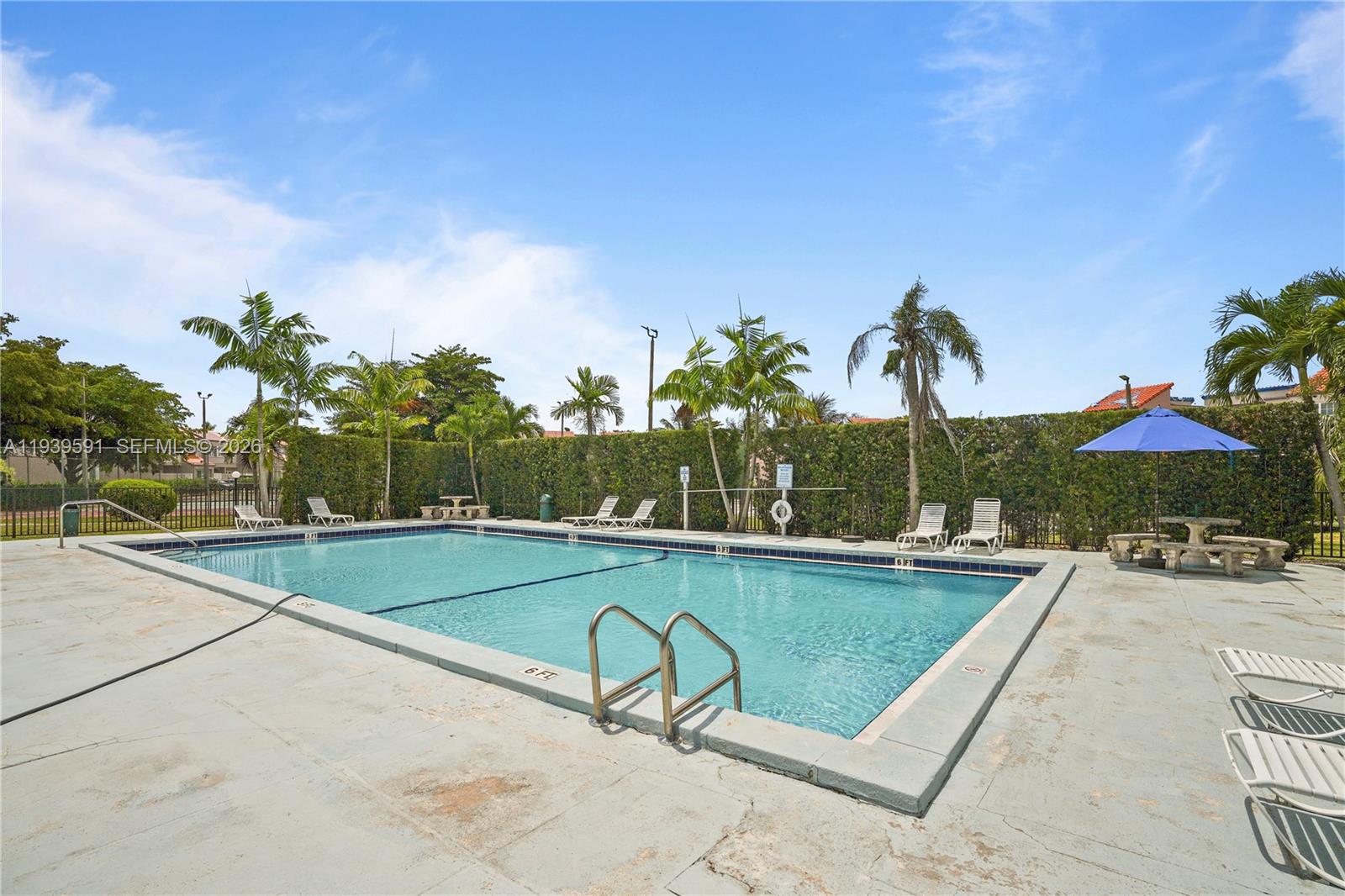 12894 Southwest 60th Terrace Miami, FL 33183 - Photo 60 of 66 swimming pool view with a garden space