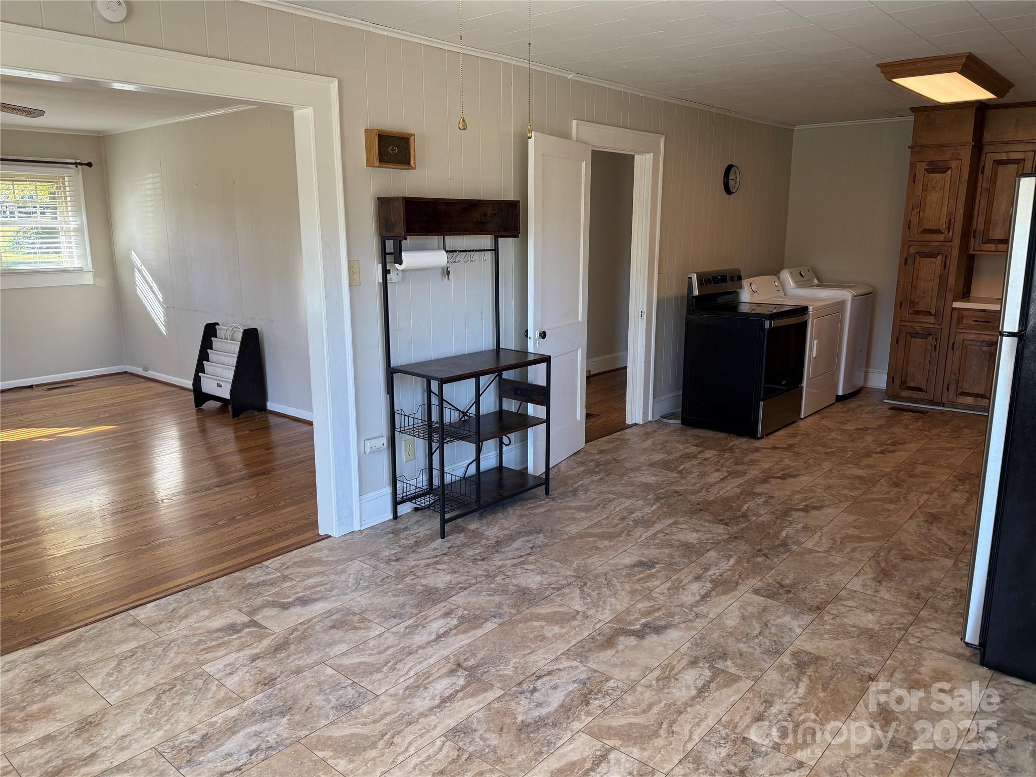 2550 Lail Road Glen Alpine, NC 28655 - Photo 14 of 35 a view of kitchen with furniture and wooden floor