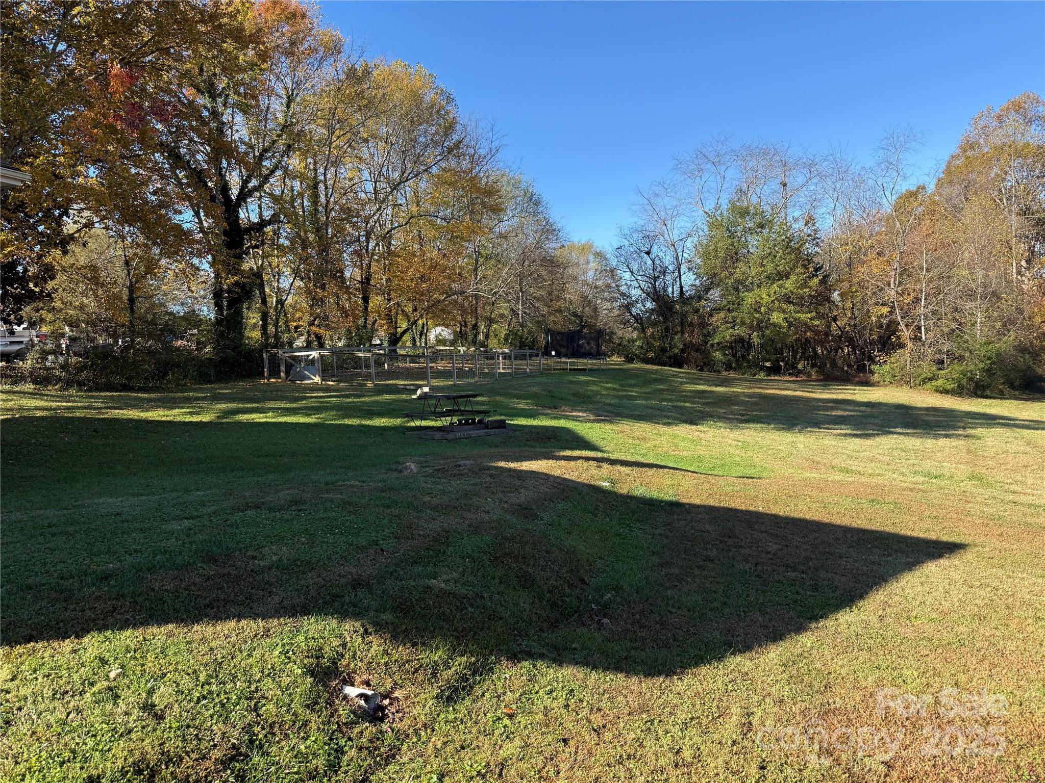 2550 Lail Road Glen Alpine, NC 28655 - Photo 27 of 35 a view of a swimming pool and a yard