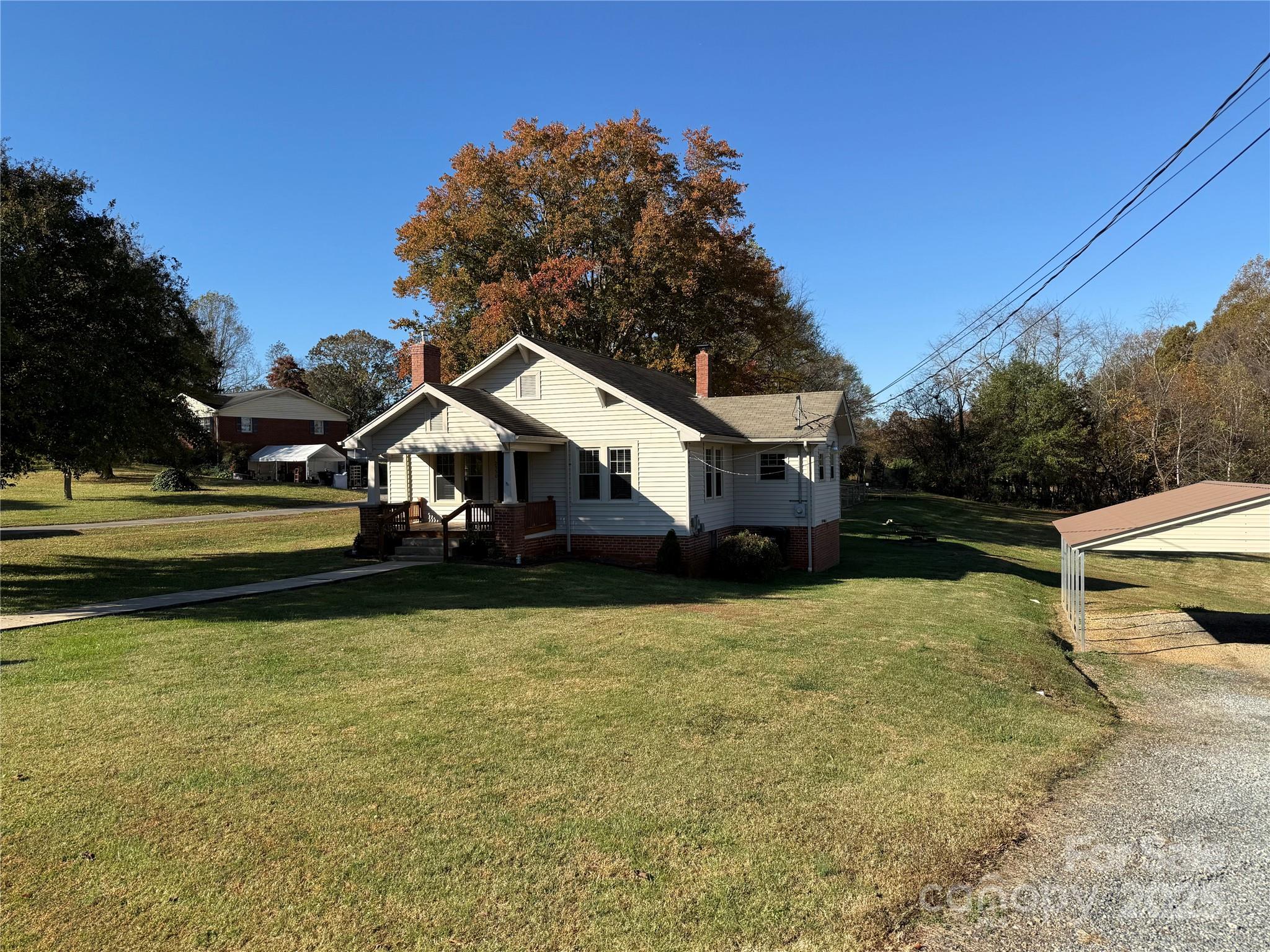 2550 Lail Road Glen Alpine, NC 28655 - Photo 28 of 35 a house view with a outdoor space