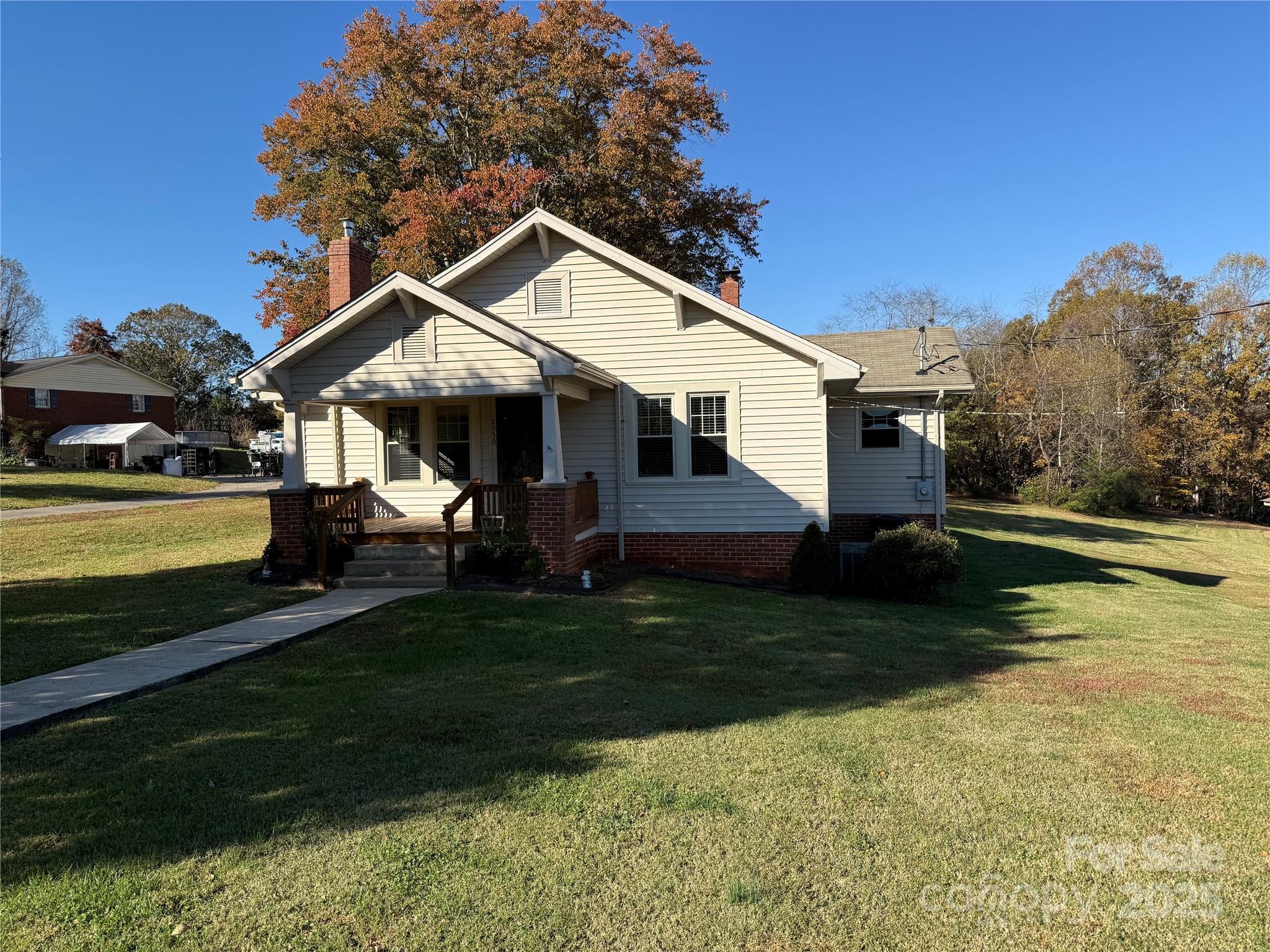 2550 Lail Road Glen Alpine, NC 28655 - Photo 31 of 35 a view of a house with a yard patio and swimming pool