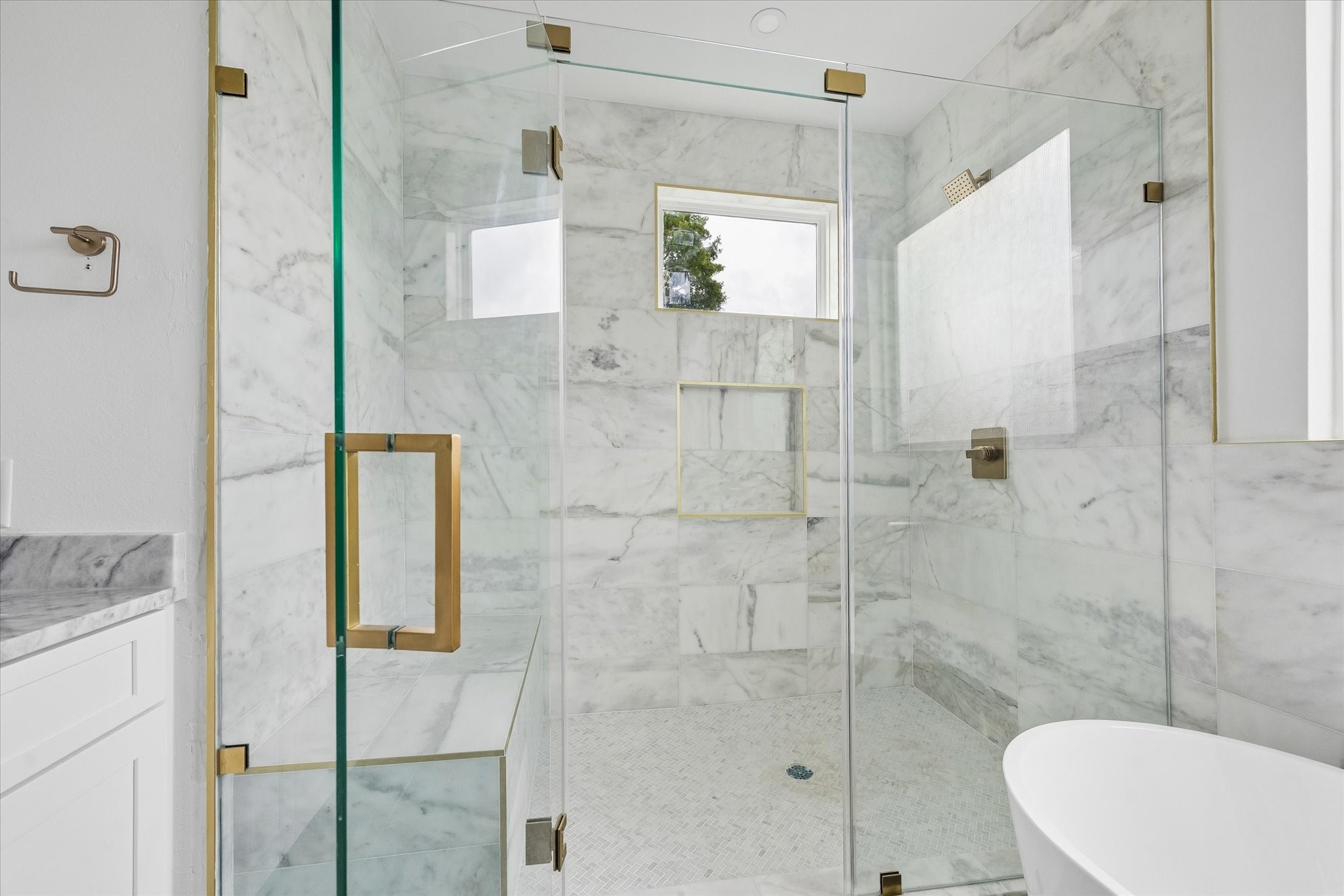 1034 West 17th Street, Unit B Houston, TX 77008 - Photo 11 of 25 Enjoy starting or ending your day in this luxurious glass-enclosed shower.