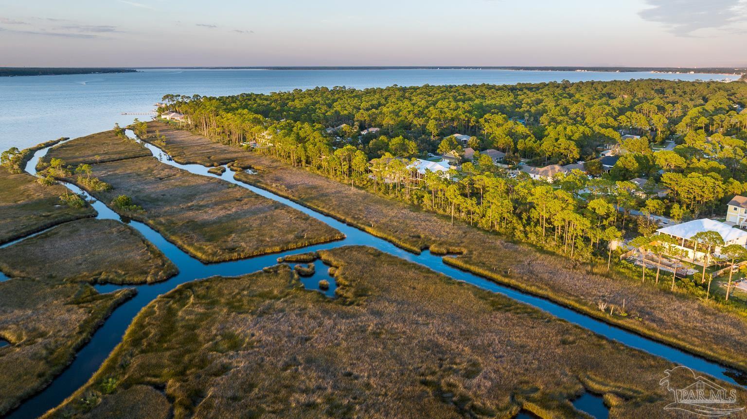 5314 North Shore Road Pensacola, FL 32507 - Photo 10 of 23 a view of a pool and an outdoor space