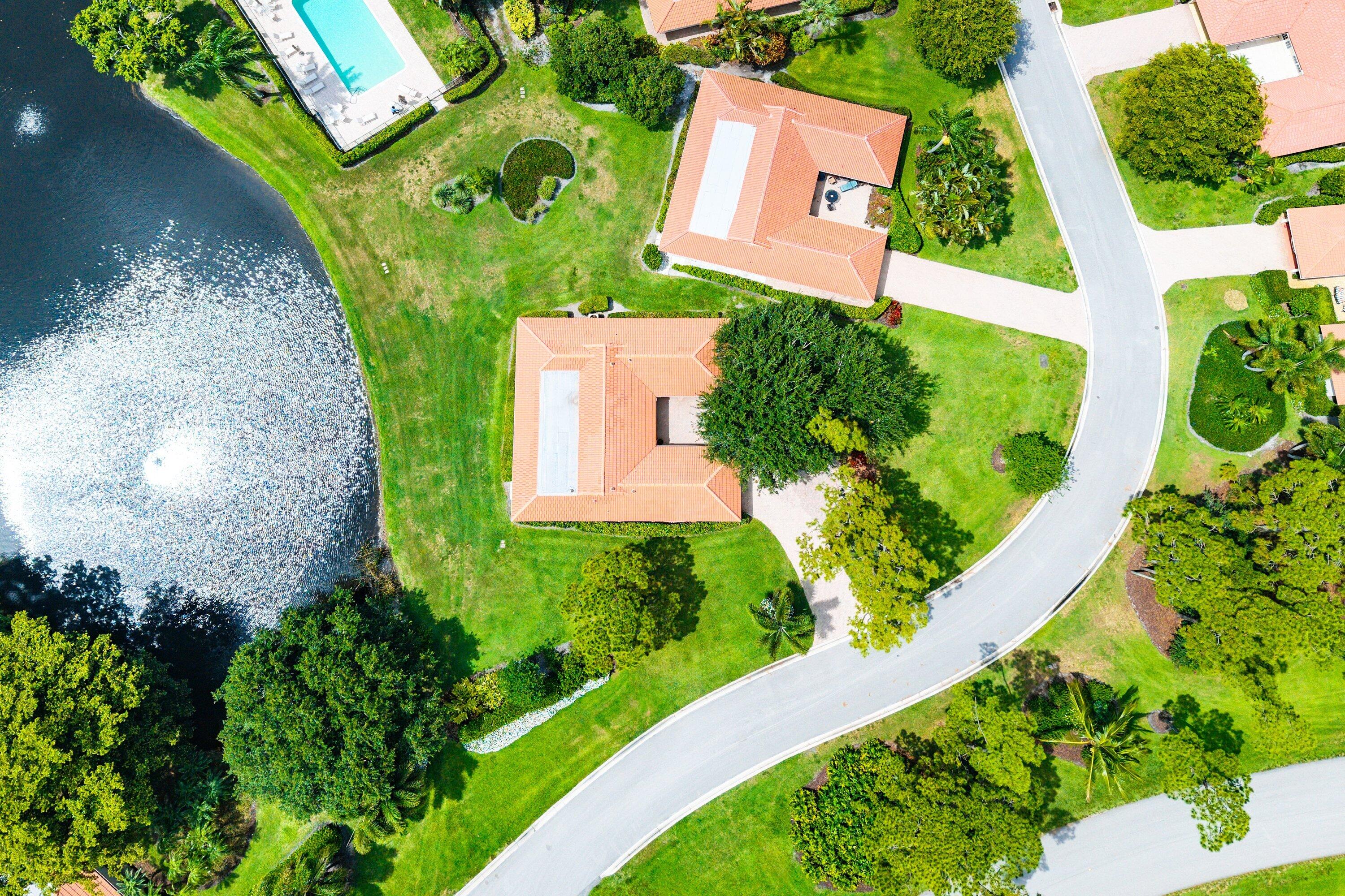 4365 Shell Drake Lane Boynton Beach, FL 33436 - Photo 34 of 56 an aerial view of a house with a yard