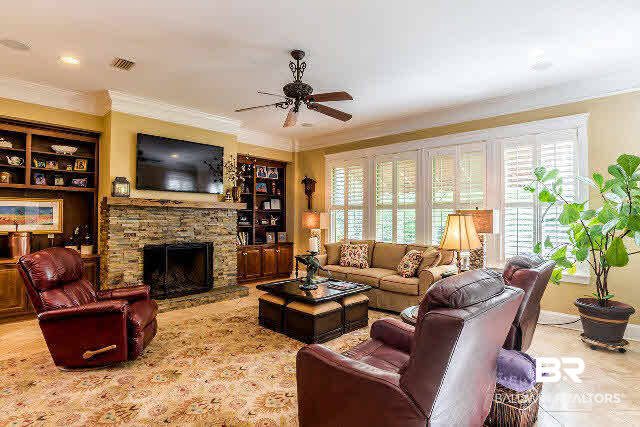 33509 Alder Circle Daphne, AL 36527 - Photo 11 of 28 Keeping Room has Fireplace and Built In Bookshelves