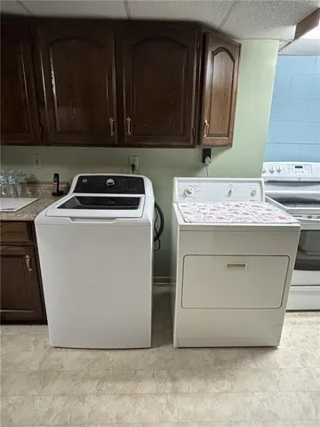 a utility room with washer and dryer