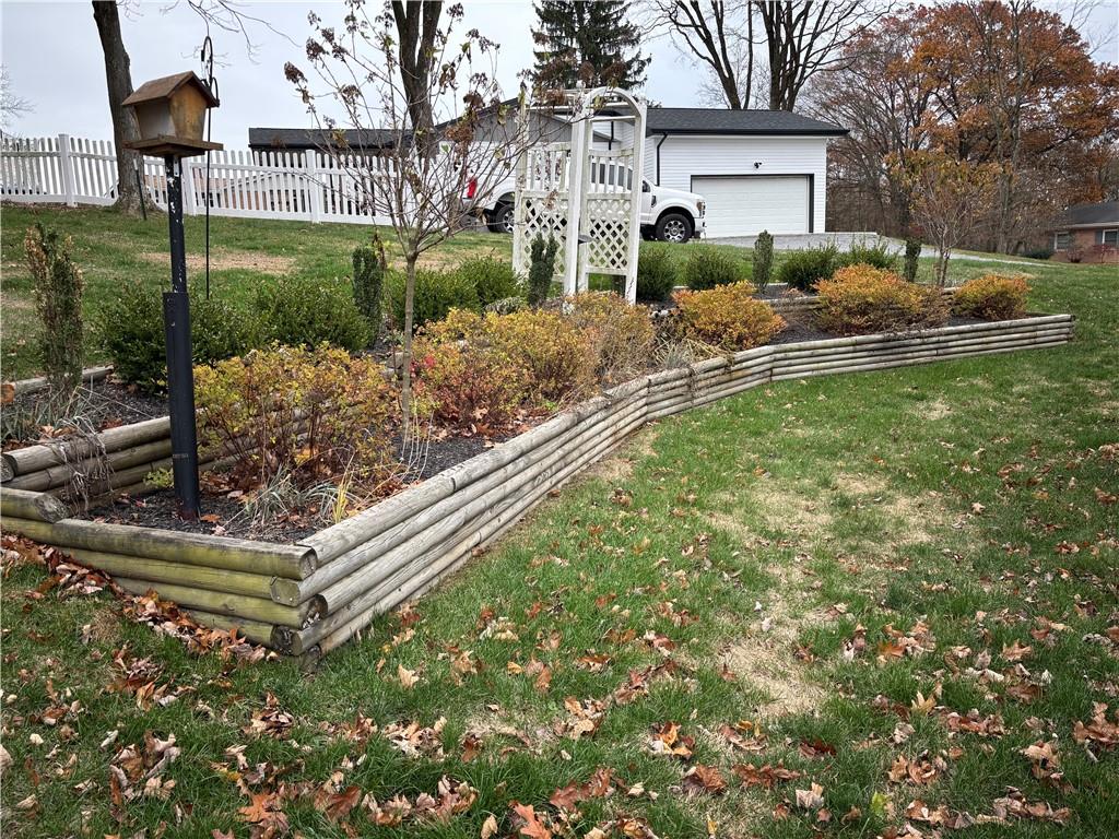 132 Marlene Road Beaver Falls, PA 15010 - Photo 24 of 25 a front view of a house with garden