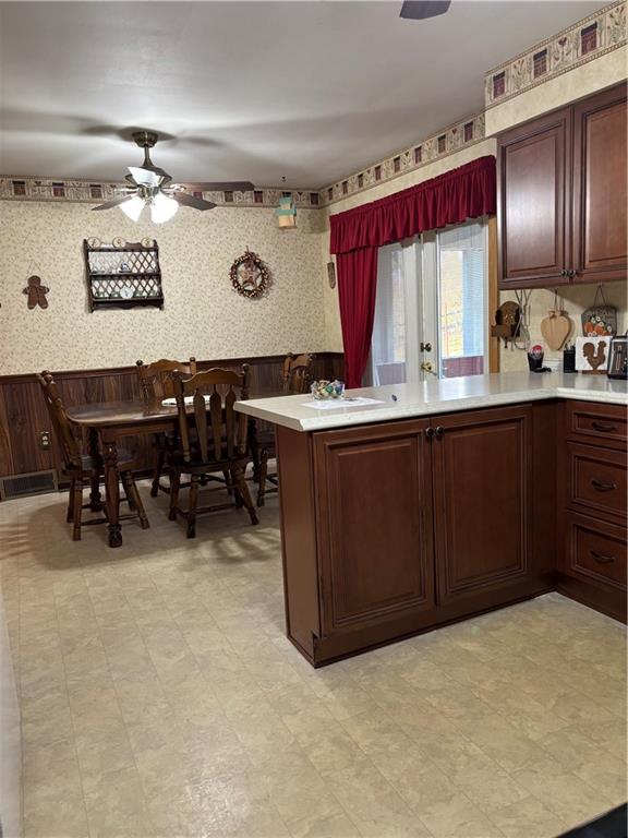 132 Marlene Road Beaver Falls, PA 15010 - Photo 5 of 25 a kitchen with a sink a stove and chairs