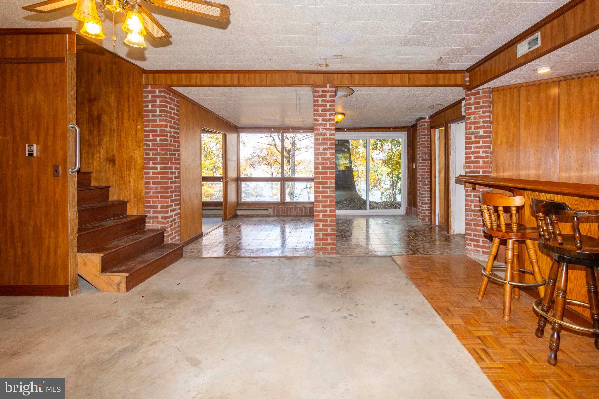 1571 Mitchell Point Road Mineral, VA 23117 - Photo 37 of 47 Basement bar & sliding door to backyard