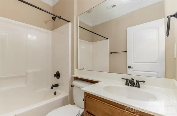 a bathroom with a sink a toilet and a bathtub