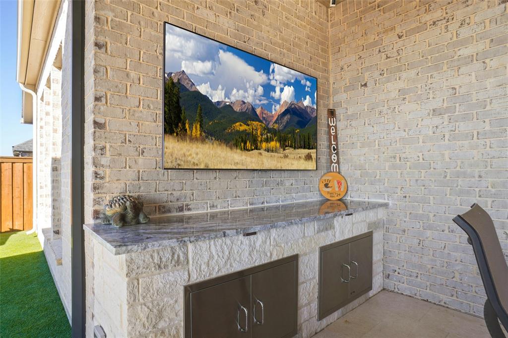 118 Alamito Road Rhome, TX 76078 - Photo 27 of 37 a bathroom with a sink and a mirror