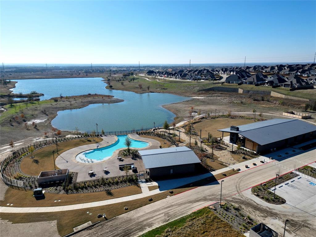118 Alamito Road Rhome, TX 76078 - Photo 33 of 37 an aerial view of a house with swimming pool and ocean view