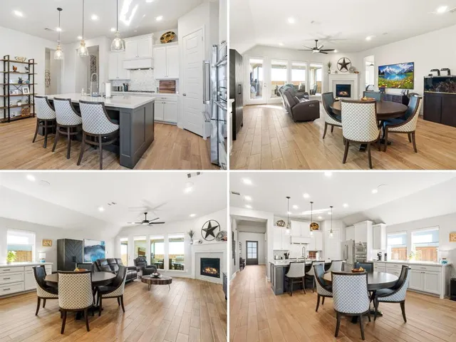 a living room with lots of furniture and kitchen view