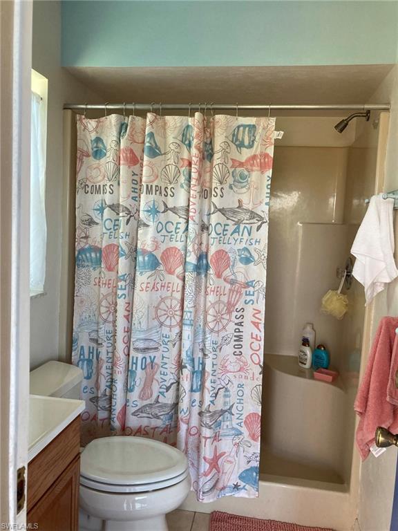 250 Pinehurst Circle Naples, FL 34113 - Photo 22 of 23 a bathroom with a toilet and a shower