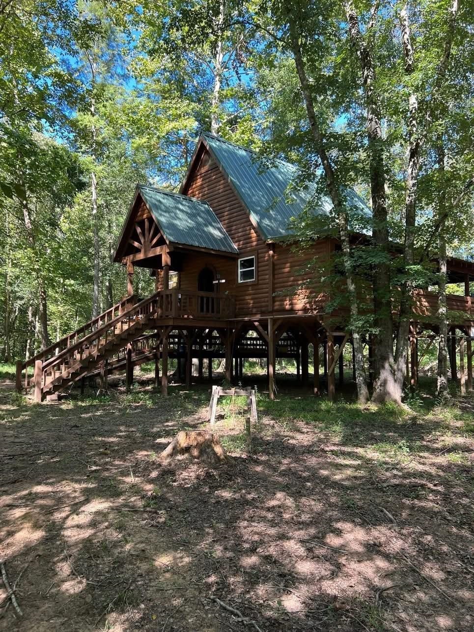 2895 Sain Road Bolivar, TN 38008 - Photo 30 of 36 a view of a house with a yard