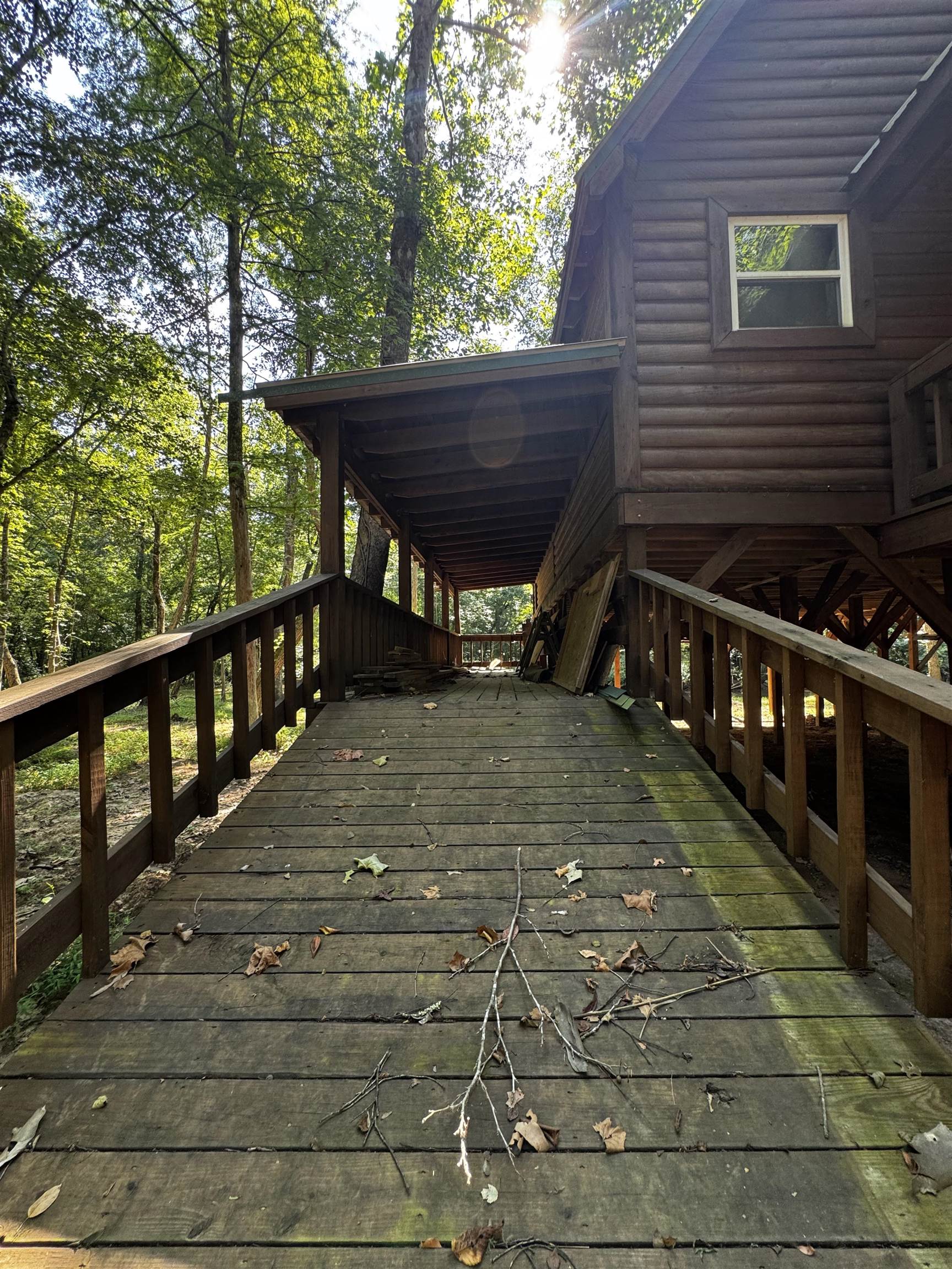 2895 Sain Road Bolivar, TN 38008 - Photo 9 of 36 a view of a wooden deck front of house