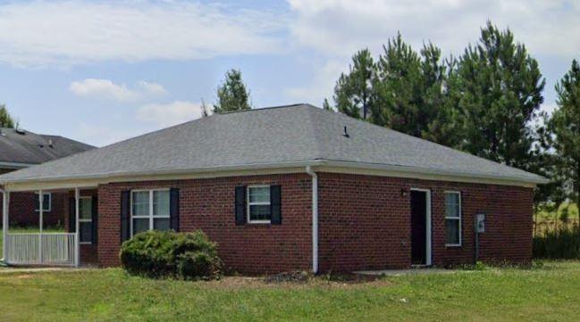 504 Dove Way Social Circle, GA 30025 - Photo 2 of 16 front view of a house with a yard