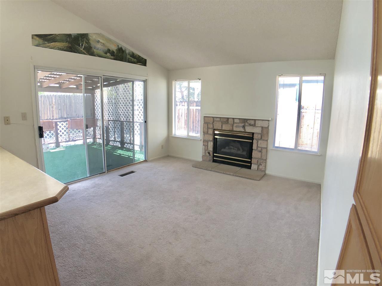 6364 Chesterfield Lane Reno, NV 89523 - Photo 13 of 29 a view of livingroom with furniture and fireplace